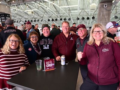 Alums at a tailgate in Portland.