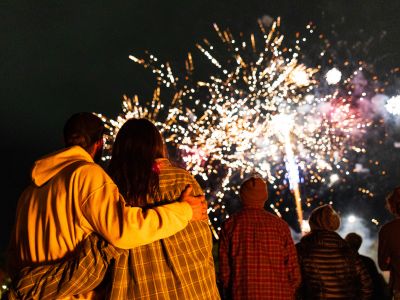 A couple watches the fireworks