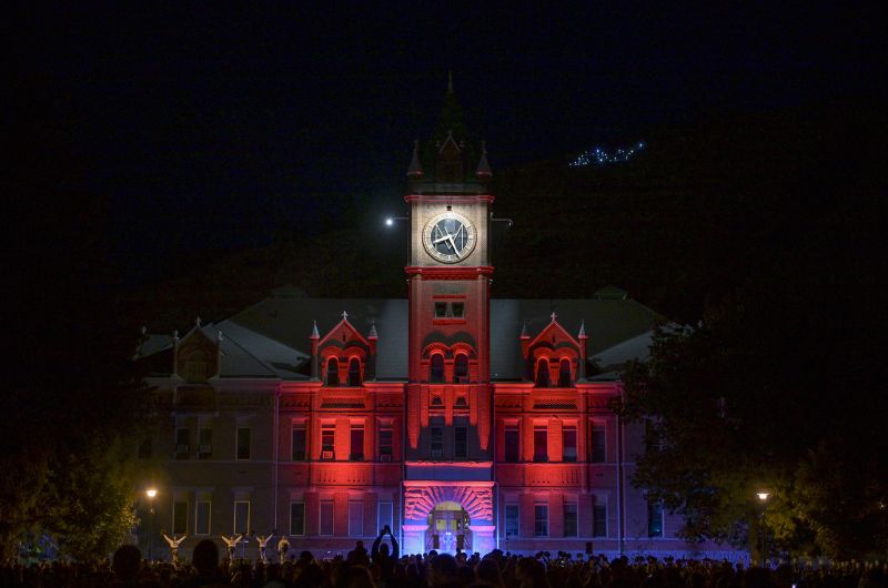 Main Hall lit up with colorful lights at the Yell Night Pep Rally