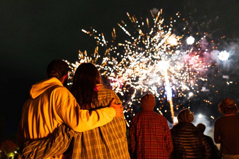 A couple watches the fireworks