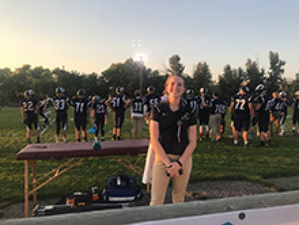 AT Student with Football Team