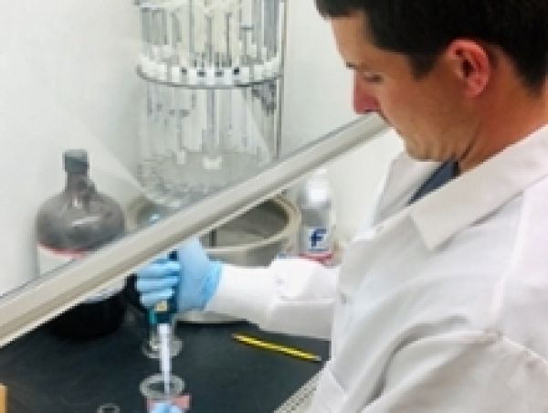 Student with pipettes