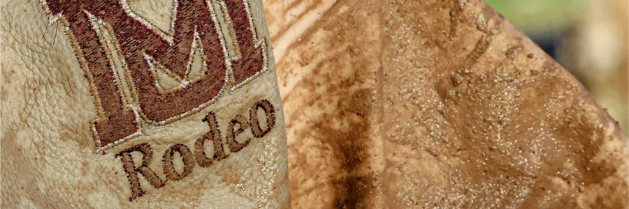 ؿ Rodeo team logo on a weathered cowboy vest.