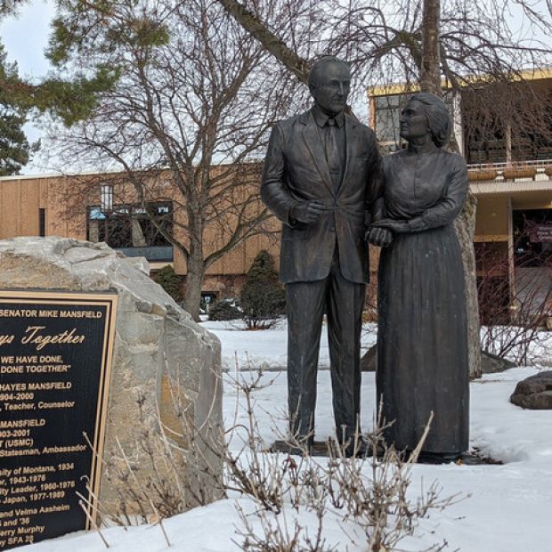 Statue of mike mansfield standing in the snow