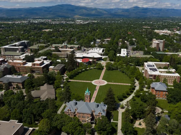 Aerial, birds-eye view of the University of Montana campus in Missoula, MT on a sunny Spring day.