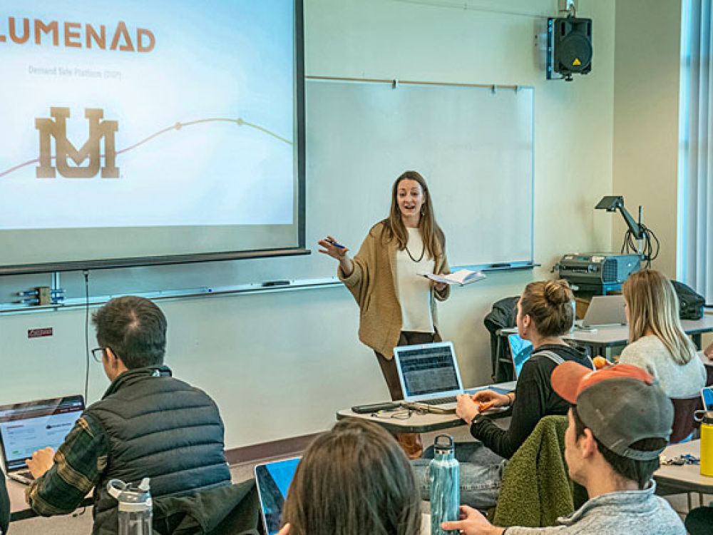 Instructor Jenni Graff teaches a class in the UM business college
