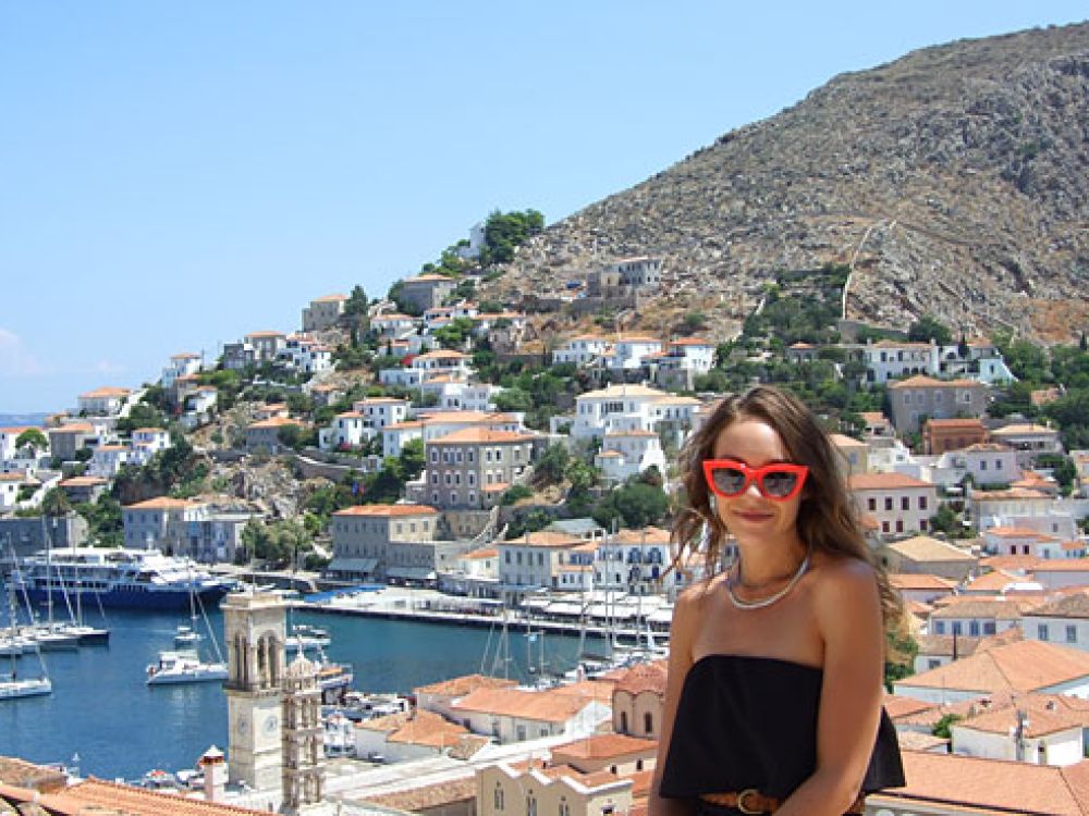 A picture of Tori Bigelow wearing shades in Europe.