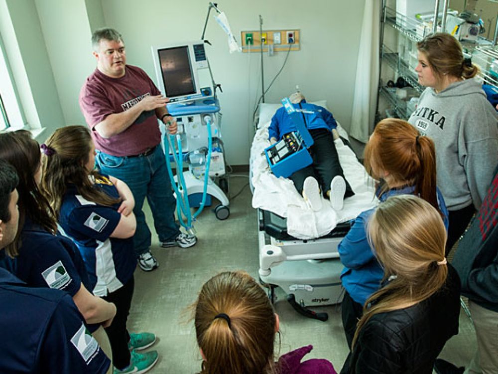 Paul Crockford, respiratory care director at Missoula College, teaches health students in ventilator use.