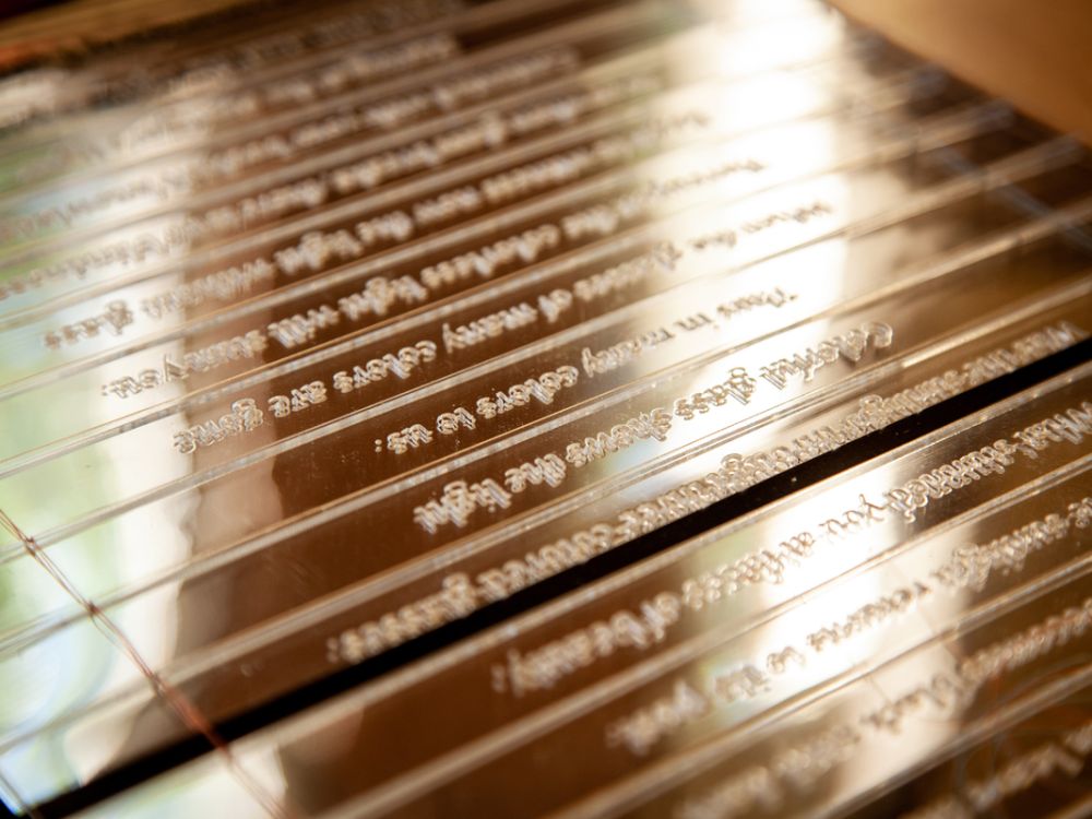 A very artsy closeup of some binders of books 