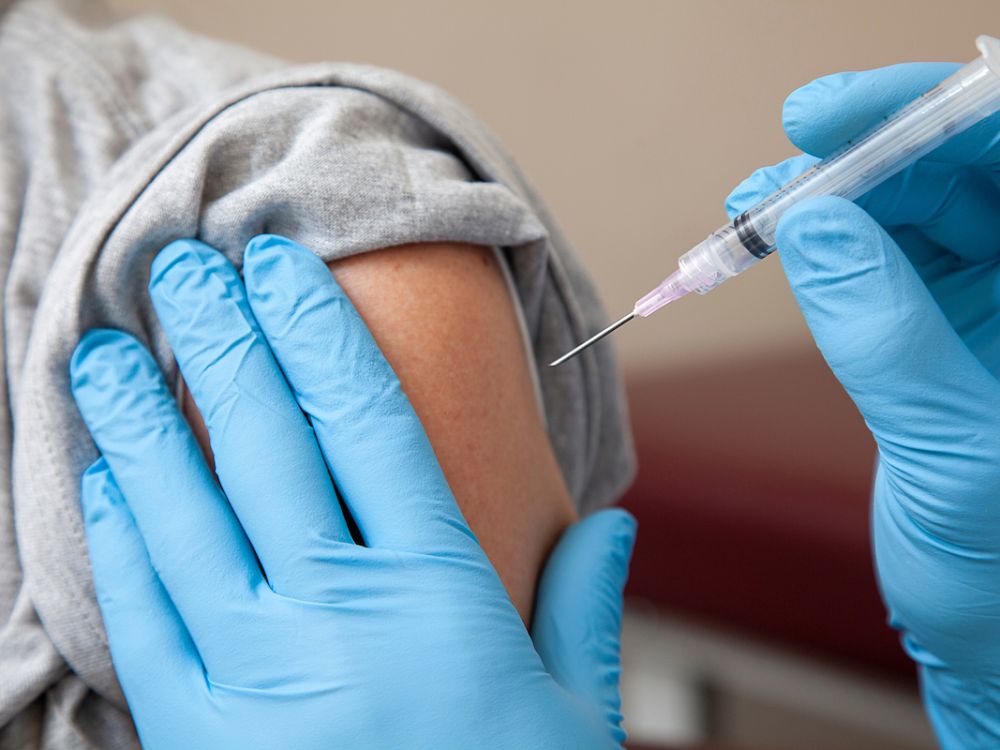 Photo of someone getting a shot