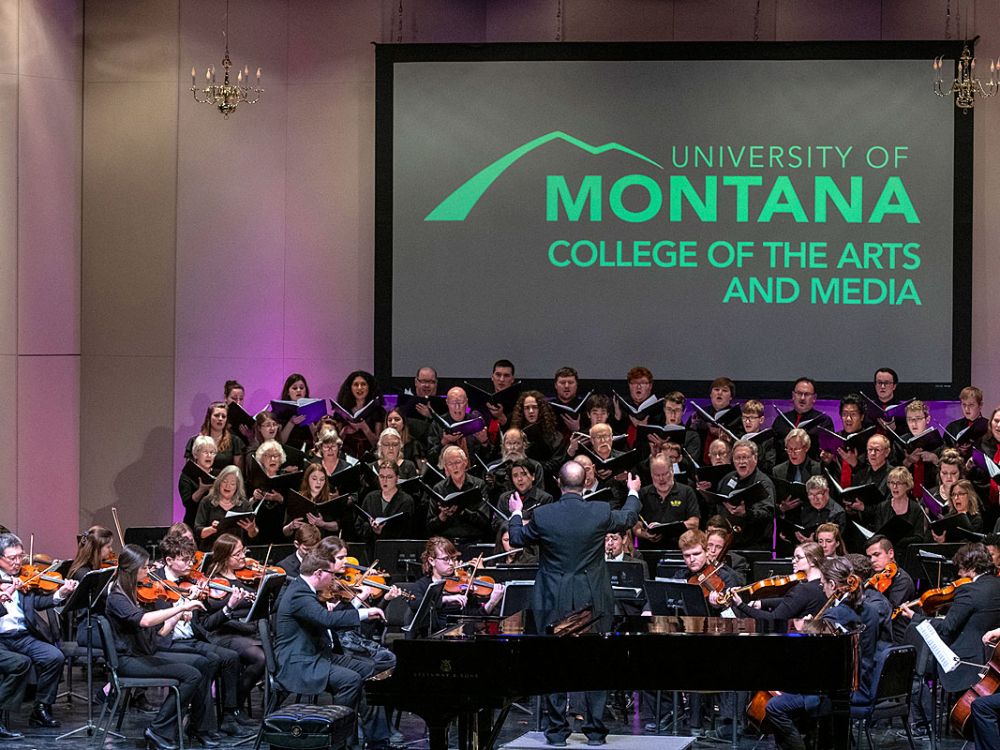 An orchestra performs at a UM College of the Arts and Media event.