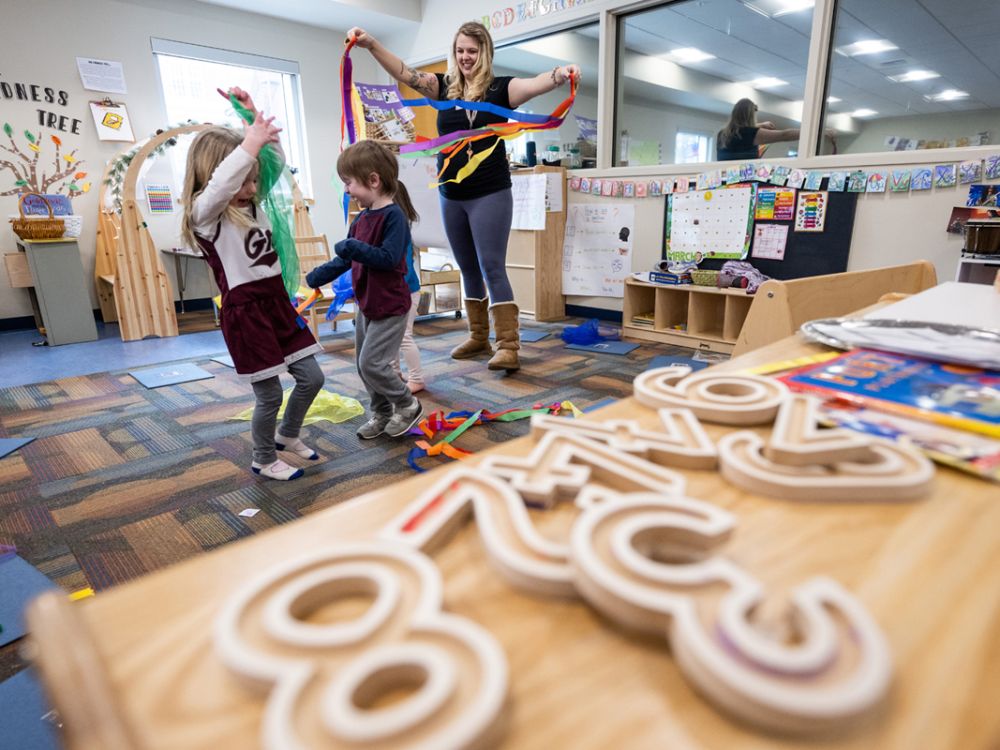 A photo of children learning and playing in UM's LAB Preschool. 