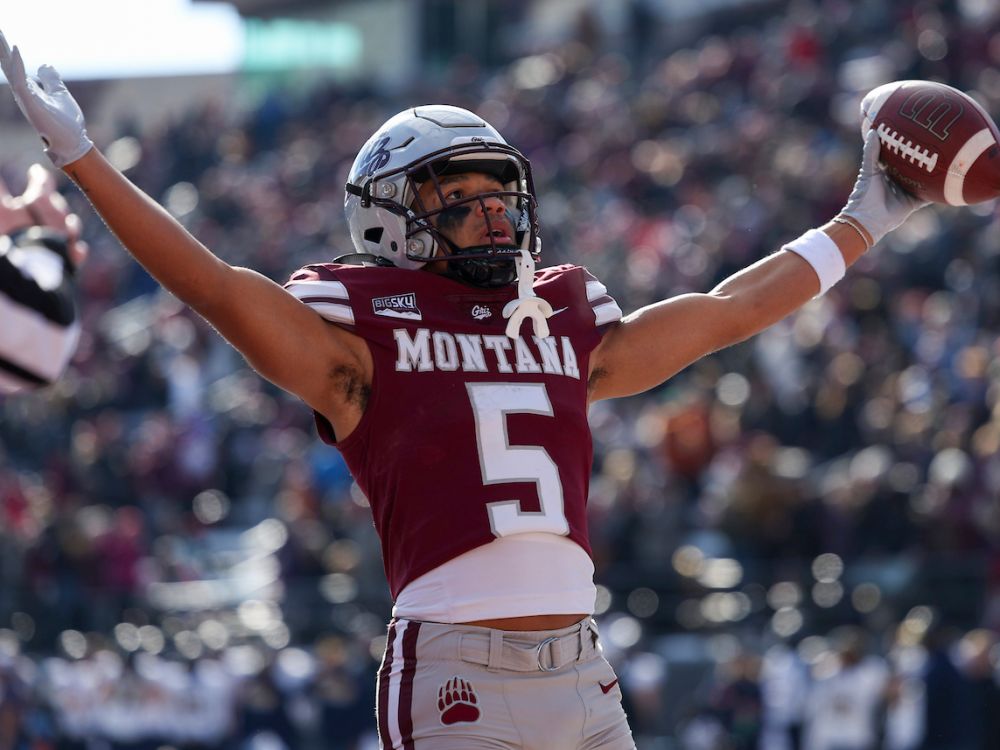 Junior Bergen scores a touchdown at Washington-Grizzly Stadium