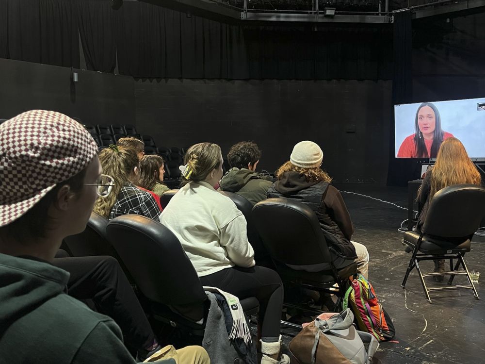 Photo of Lily Gladstone talking to theater students via Zoom