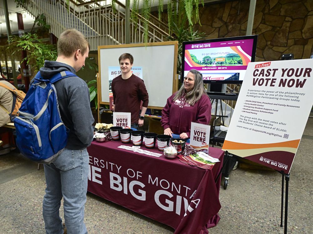 : A student visits the The Big Give table in UM’s University Center.