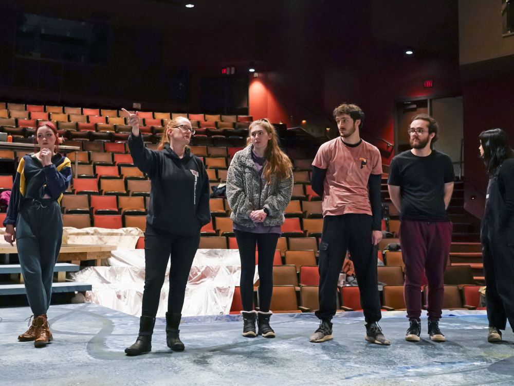 A photo of Bernadette Sweeney with her students. 