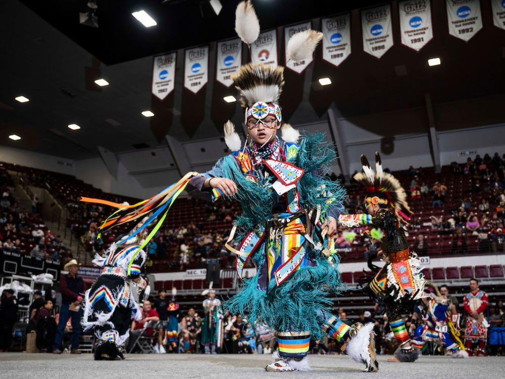 A young man participates in the 54th annual Kyiyo Pow Wow in 2023.