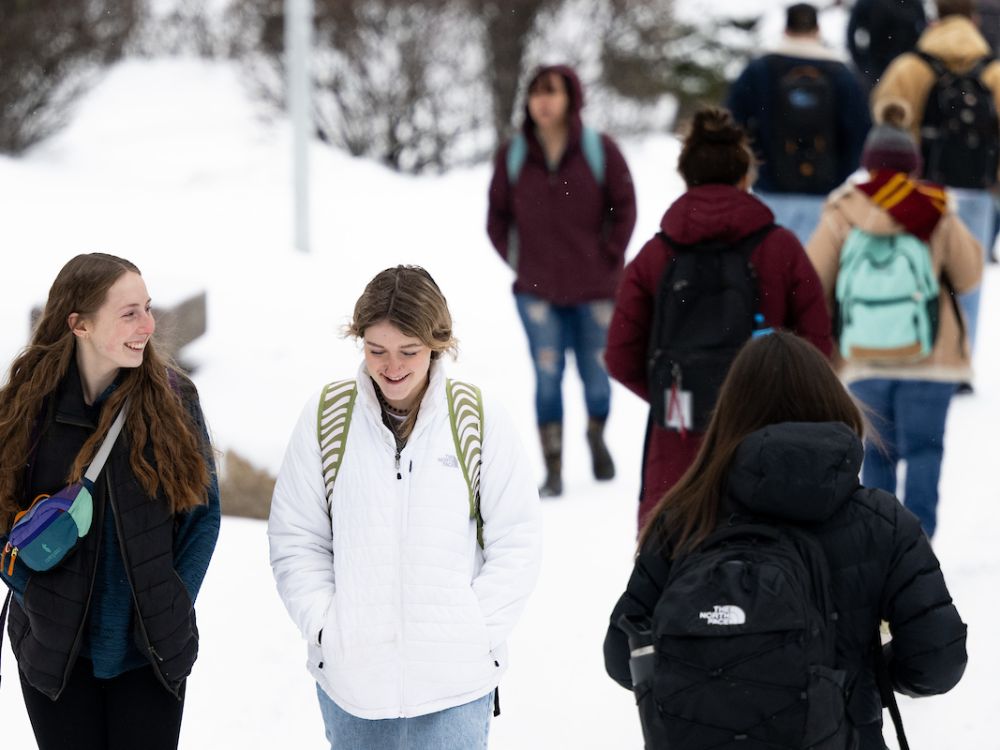 UM students walk across the Oval on the first day of the semester