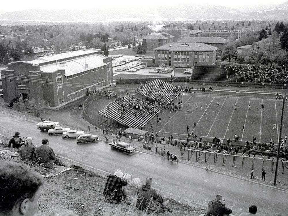 Griz fans in the 'Hillside Club' above Dornblaser Field on the UM campus circa 1967-1968. 