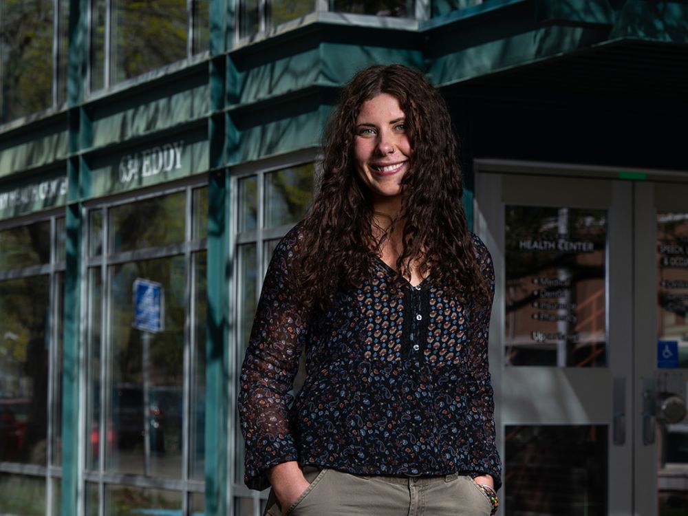 A picture of Taylor Sadewic outside the Curry Health Center.