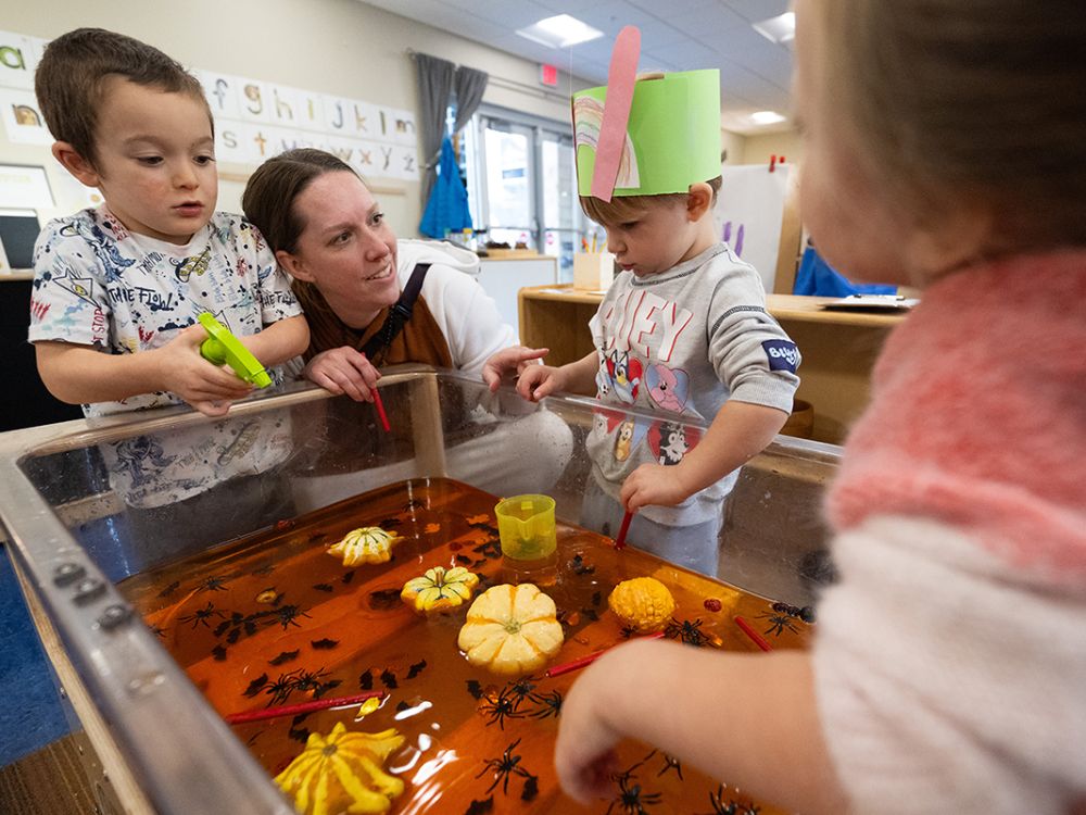 Danielle Bailey works with young students.