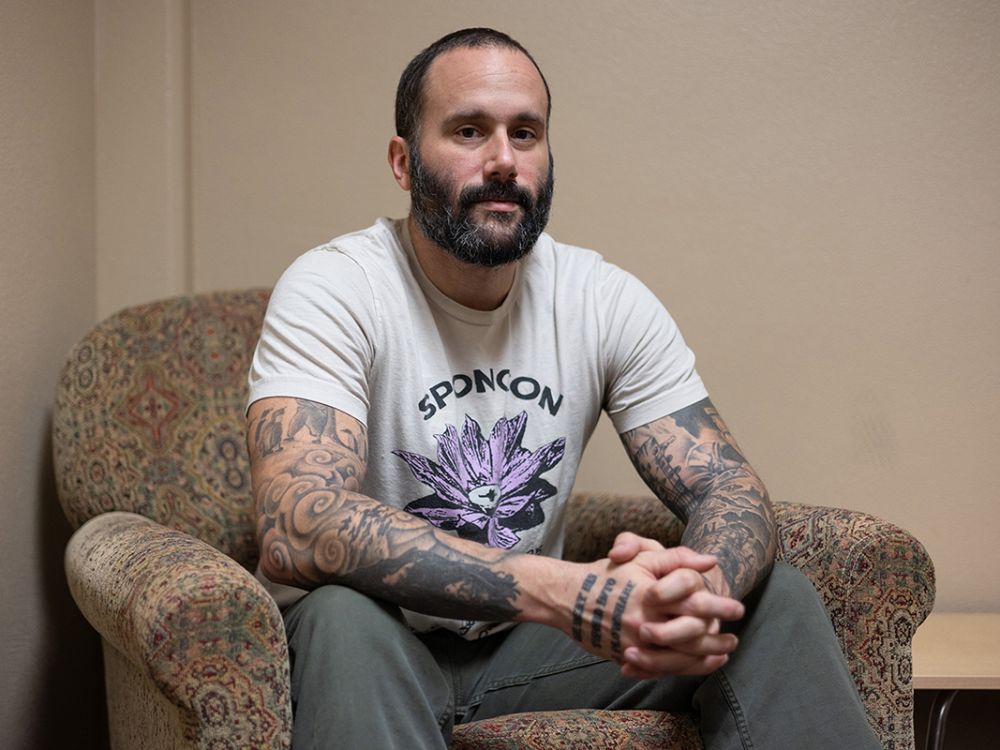 A picture of David Payseno in a chair.