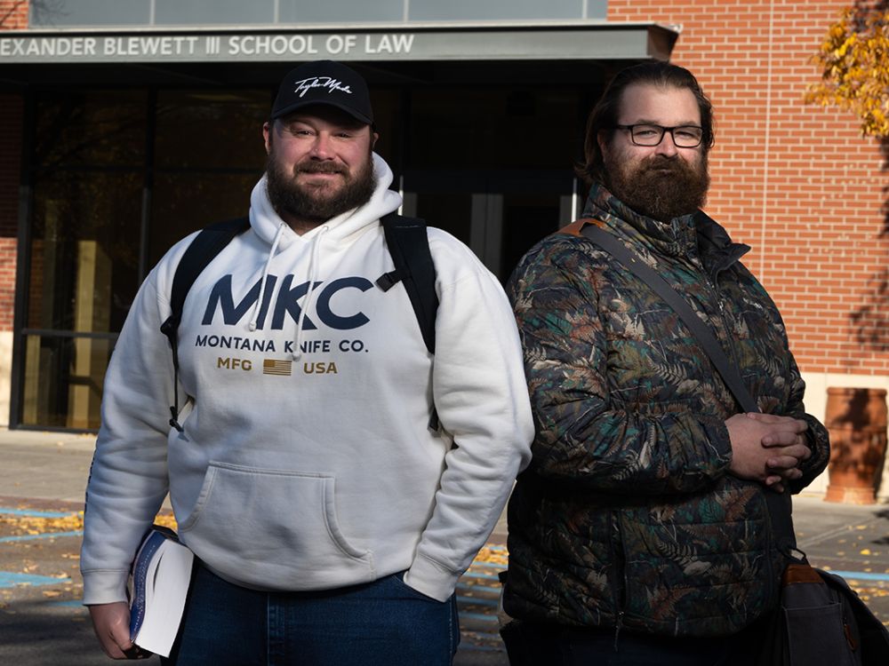 UM law students Remington Prochaska (left) and David Ley pose outside the Law Building.