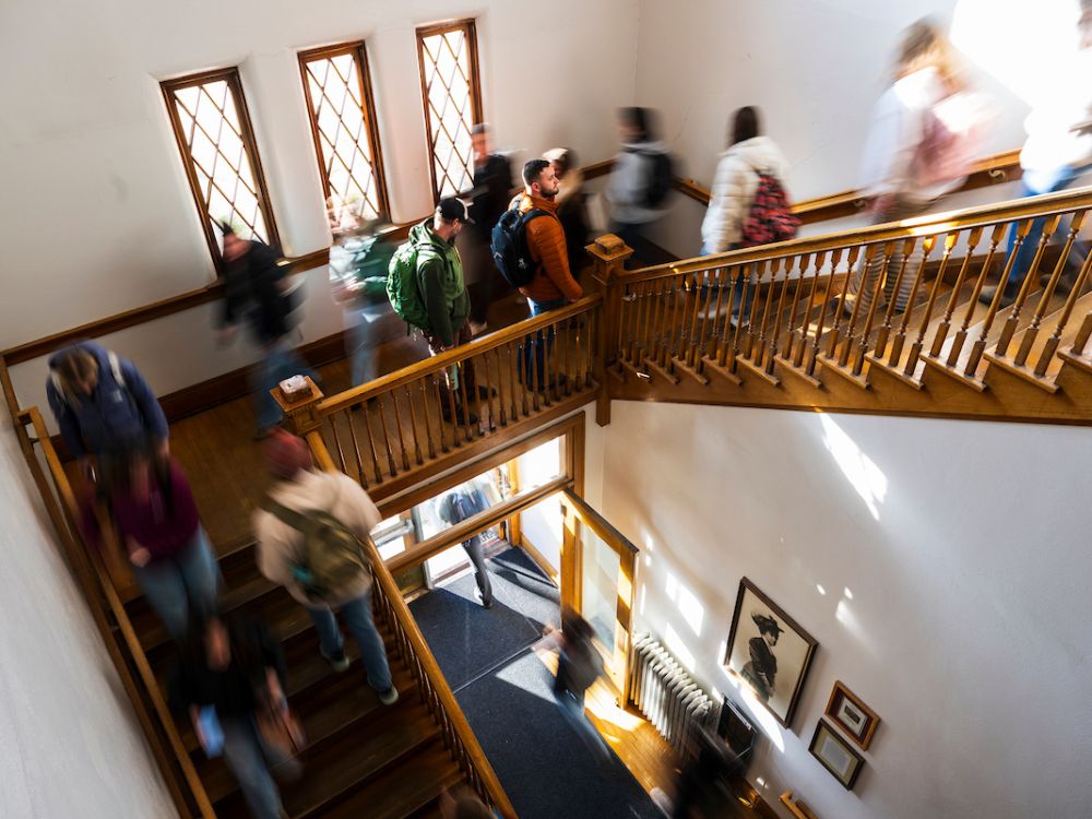 Students walk up the stairs of Janette Rankin Hall