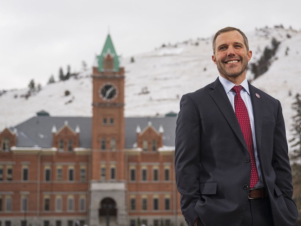 UM President Seth Bodnar stands in front of Main Hall