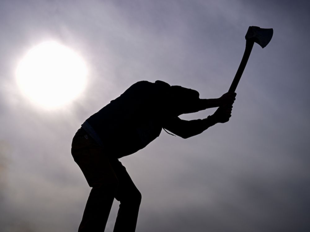 A UM student competes in Forestry Days.