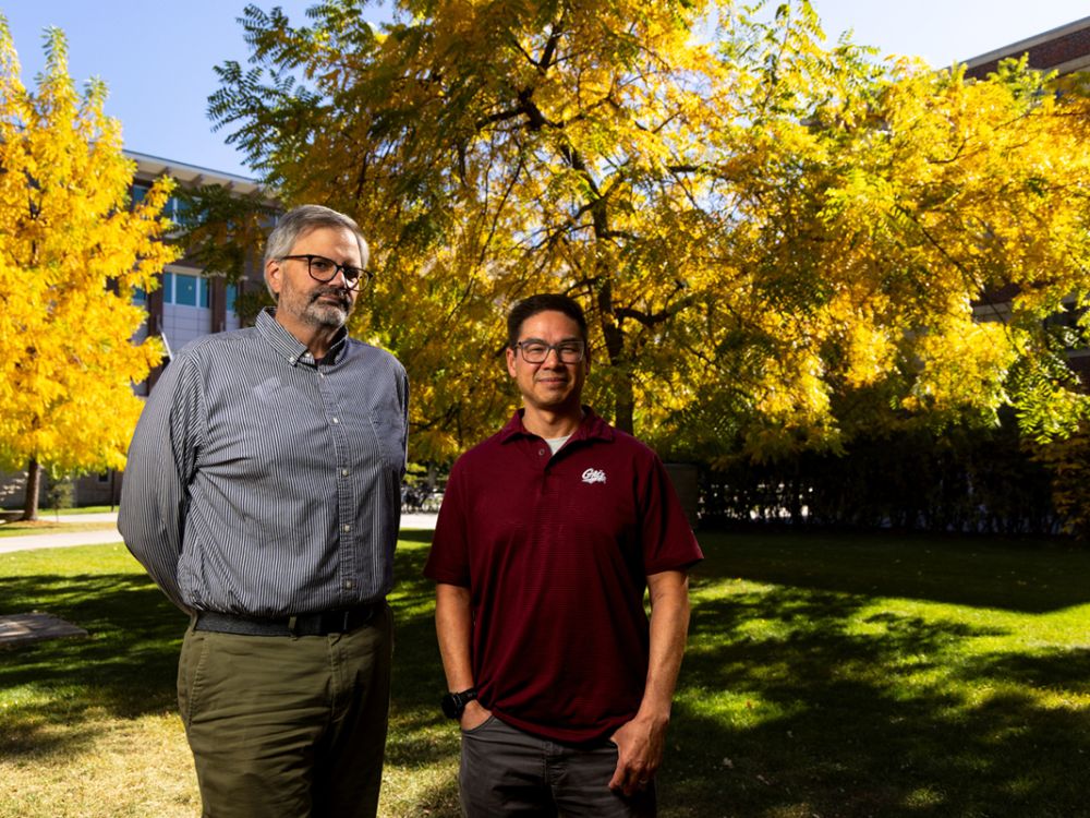 An image of Michael Cassens and Lee Banville on campus. 