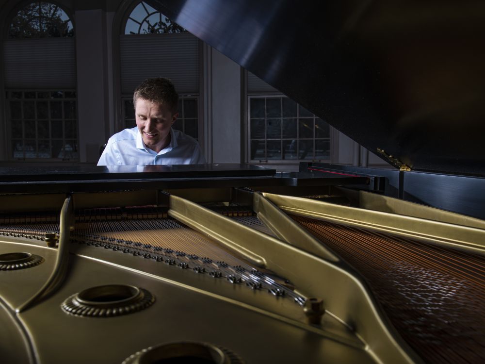 UM student Ryan Garnsey playing the piano 