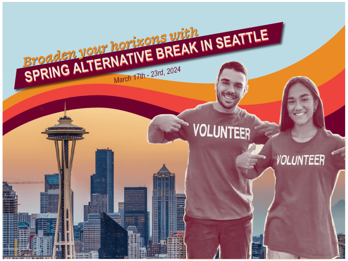 Volunteers in front of Seattle skyline