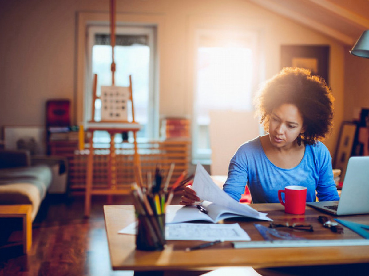 Woman focusing on lesson.