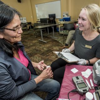 Patient talking with pharmacist