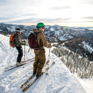 View of skiers overlooking valley