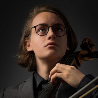 David Harmsworth, a UM rising senior and cello performance major, with his cello