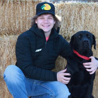 Conrad High School senior Brady Barnhill, pictured with his dog Diesel.