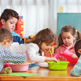 group of kids plying with blockes