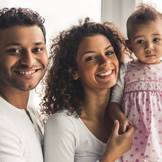 parents with their baby girl