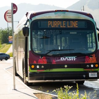 bus stopped at purple line bus stop on wyoming