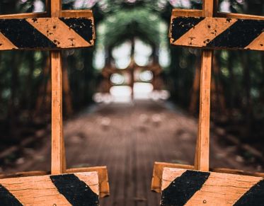 wooden traffic barriers. Photo credit to Lucas Souza.