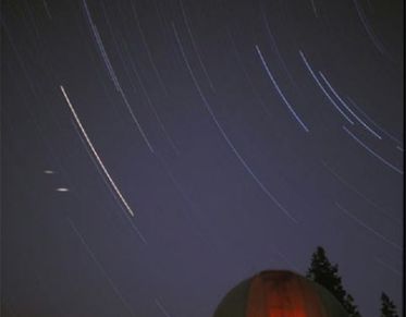 shooting star over the observatory