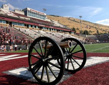 The ROTC cannon sits on the field of Washington-Grizzly Stadium