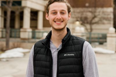Image of Connor smiling ready to help you make Missoula your next adventure
