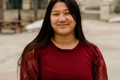 Image of Jeraca smiling, she's your food connoisseur admissions counselor
