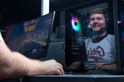 A picture of Jimmy Painter plays a video game. 