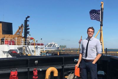 Henry Westesen poses for a photo on his ship.