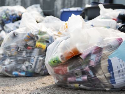 Clear bags full of combined recycling to be sorted through