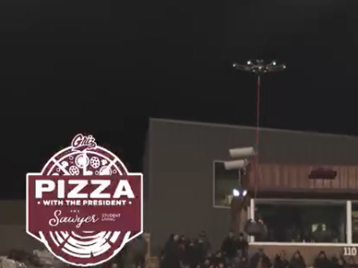 Drone carries box of pizzas as it flies across the Grizzly statium